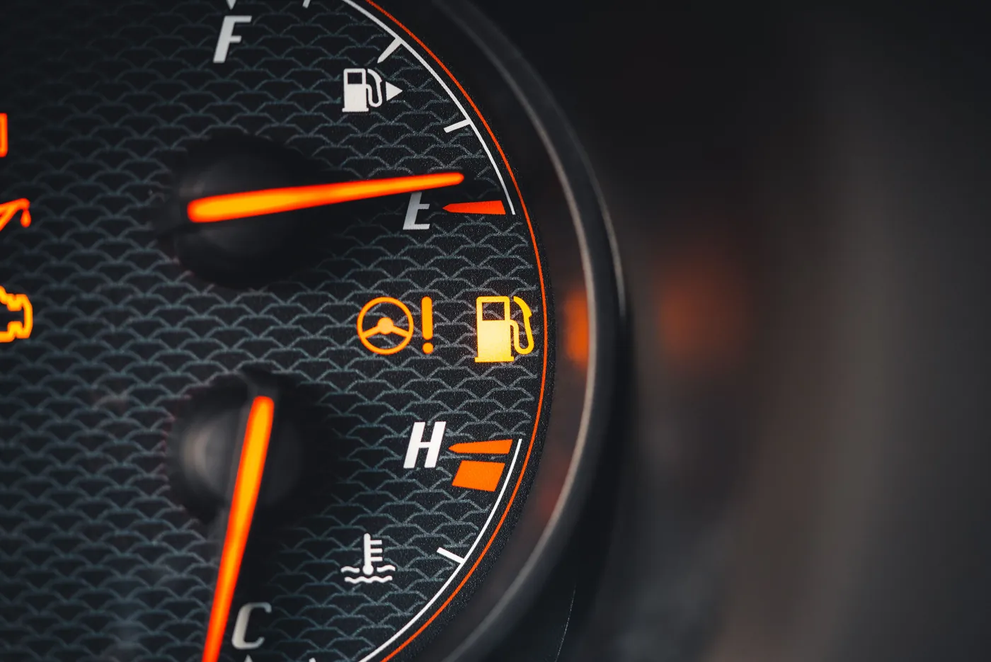 Warning lamps lit on a car's instrument cluster